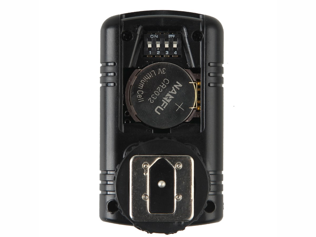 Transmitter back with CR2032 coin cell and channel DIP switches